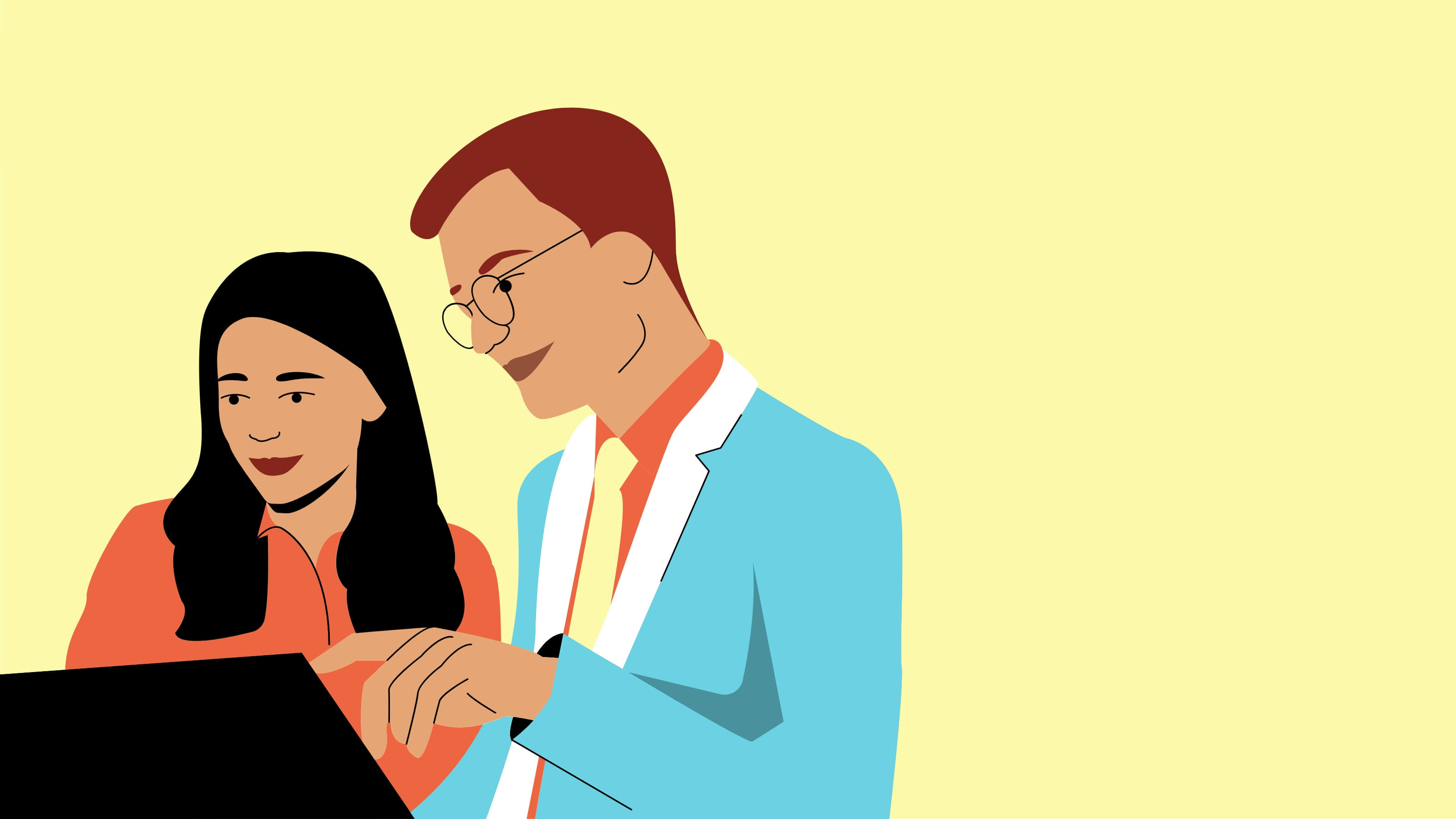 man and woman looking at a tablet together