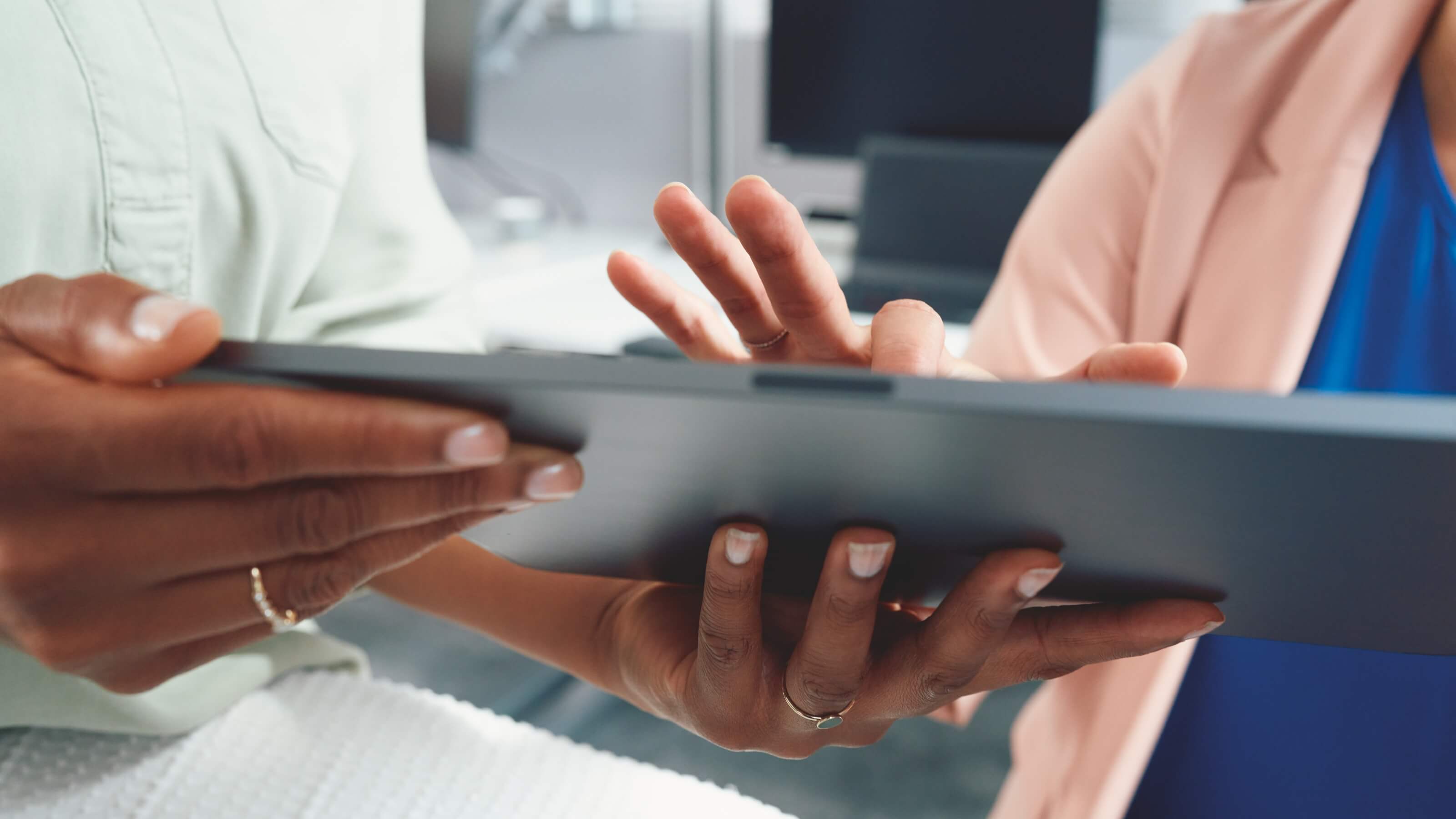 two people using a tablet
